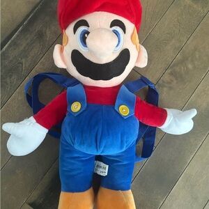 Plush Toy with Red Hat and Blue Overalls